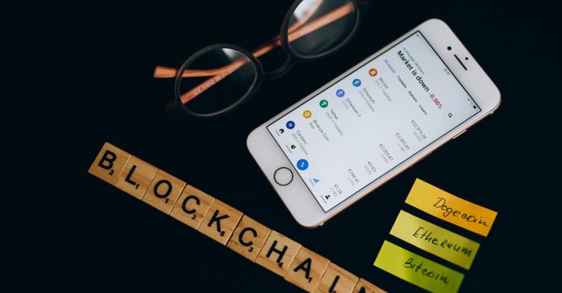 Rates - Silver Iphone 6 Beside Black Framed Eyeglasses