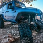 Suspension - Photo of Vehicle Parked Beside Tree