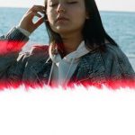 Leaks - Cute Teenage Girl Standing by the Sea