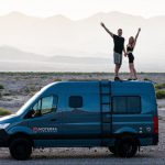 RV Living - couple standing on van