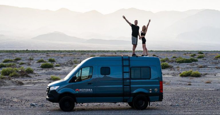 RV Living - couple standing on van
