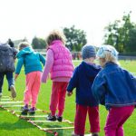 Kids - Children's Team Building on Green Grassland