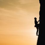 Challenges - Person Rock Climbing