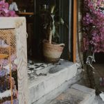 Perks - Vespa near Entrance Decorated with Flowers