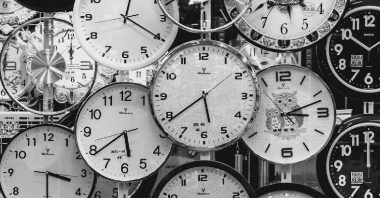 Timing - Black And White Photo Of Clocks