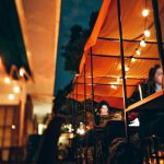 Awning - Photo of People Using Their Laptops and Computer During Night